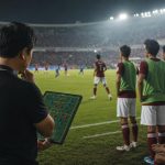Aturan Pemain Asing Super League 2026/2027: Kuota dan Batas Pelatih sepak bola mengatur strategi pergantian pemain di tepi lapangan stadion